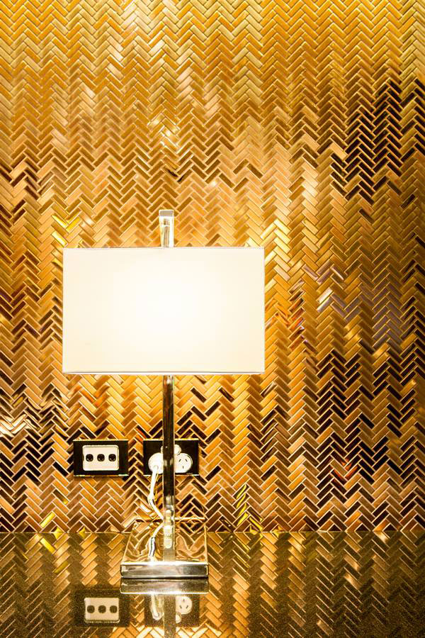 Herringbone titanium gold tile